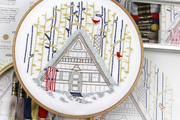 embroidery hoop art with winter ski cabin 