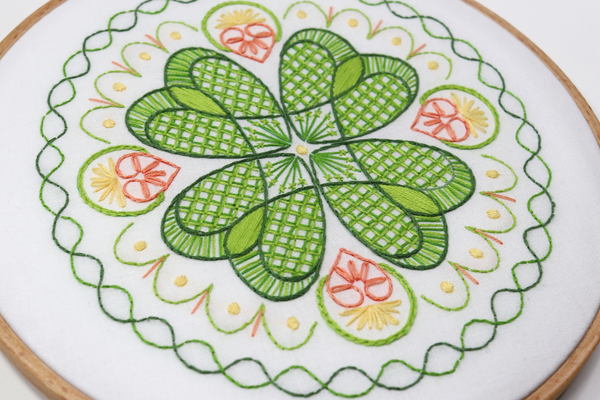 Mandala-inspired St. Patrick's embroidery kit with four leaf clover and celtic designs.
