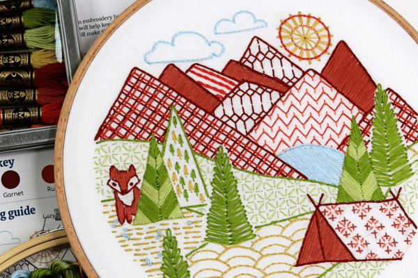 embroidered mountains filled with repeating patterns