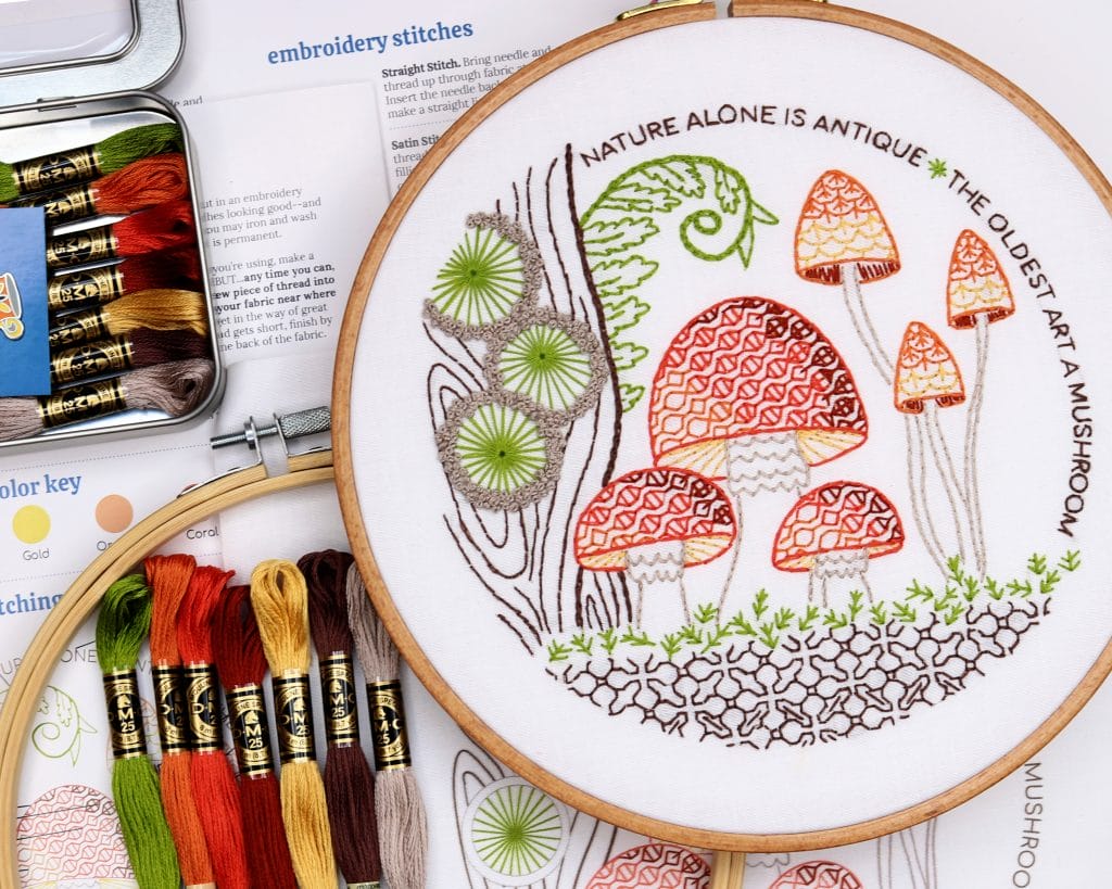 fall embroidery kit with mushrooms and embroidery floss in fall colors