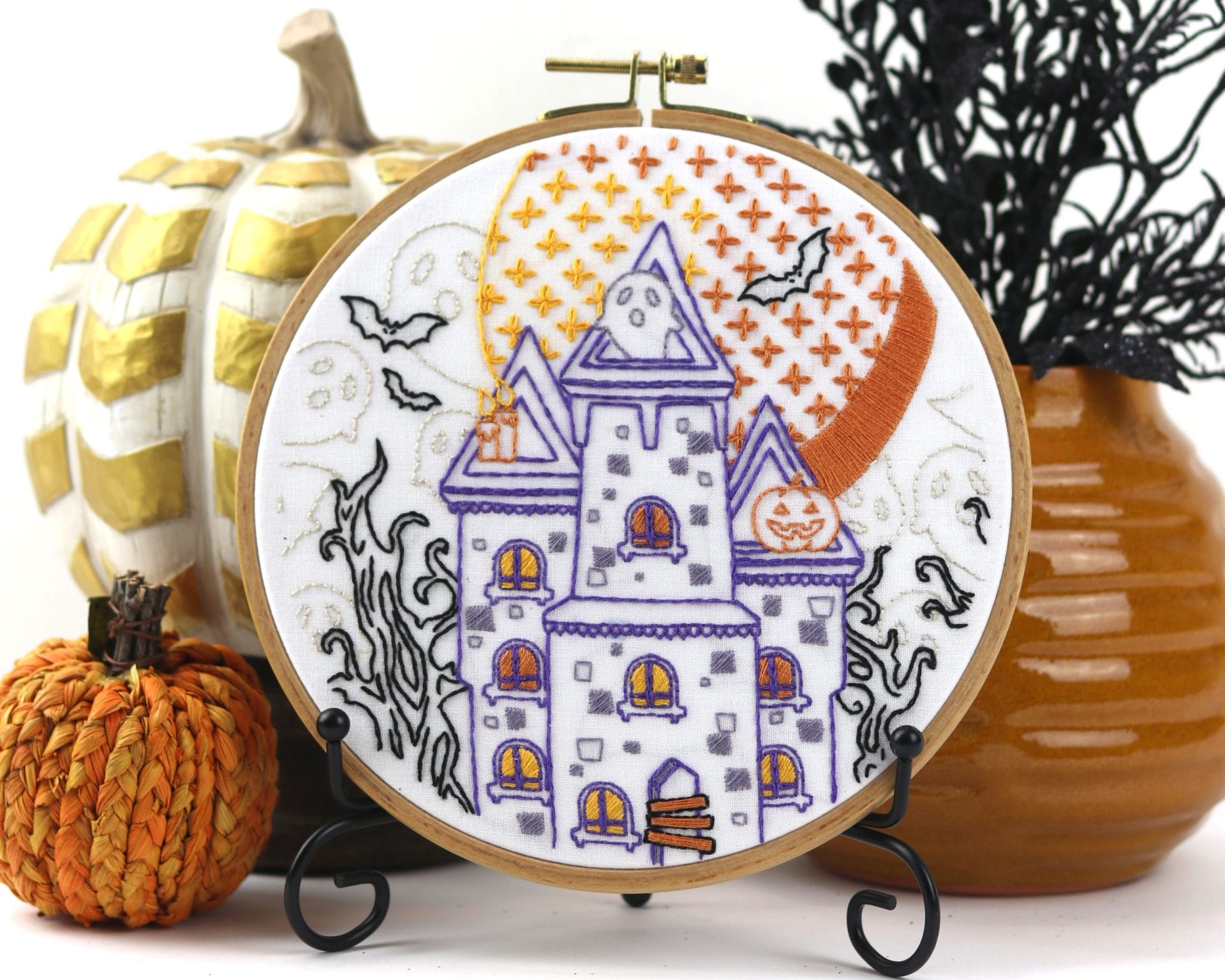 Halloween hoop art in styled seasonal vignette