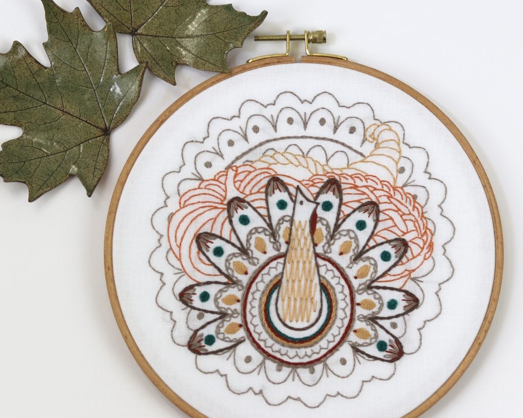 fall embroidery hoopart with harvest table turkey, pumpkin and cornucopia