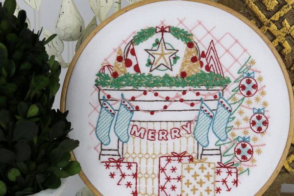 Holiday-styled vignette with embroidered Christmas Mantle embroidered hoop-art