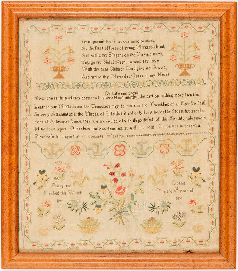 early example of framed embroidery stitch sampler 