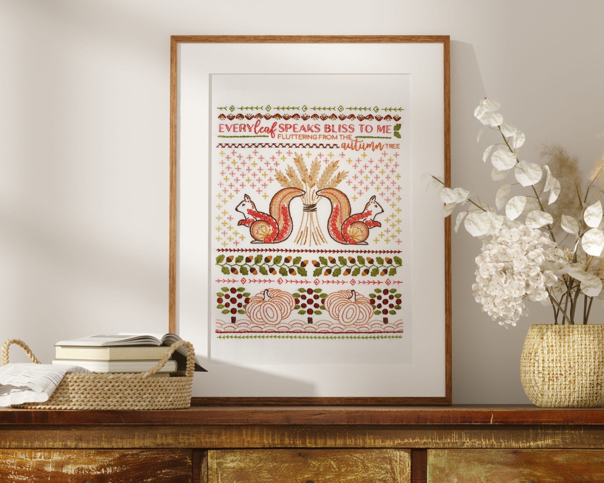 Traditional embroidery stitch sampler with fall theme
