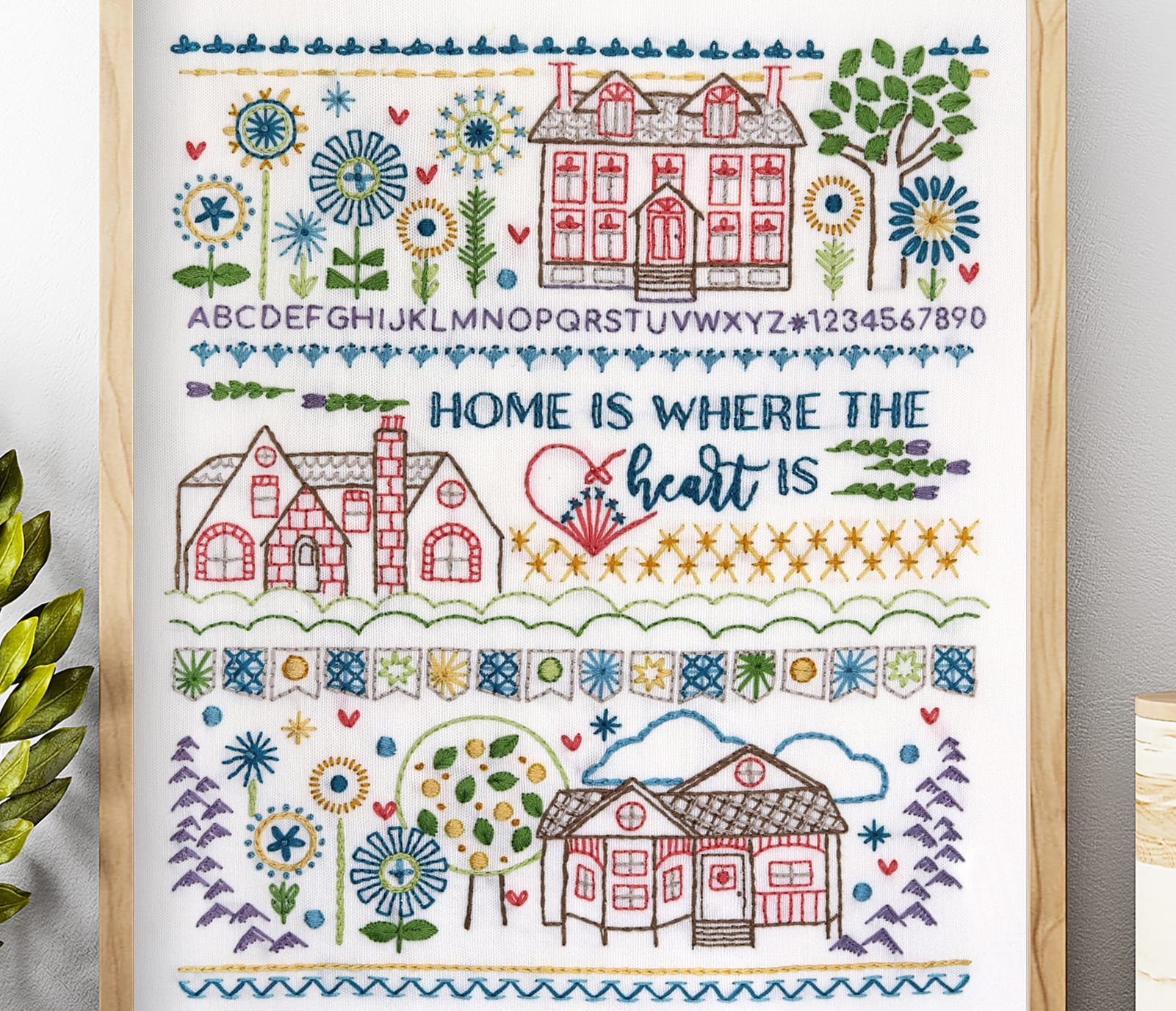 Traditional embroidery stitch sampler with home themes