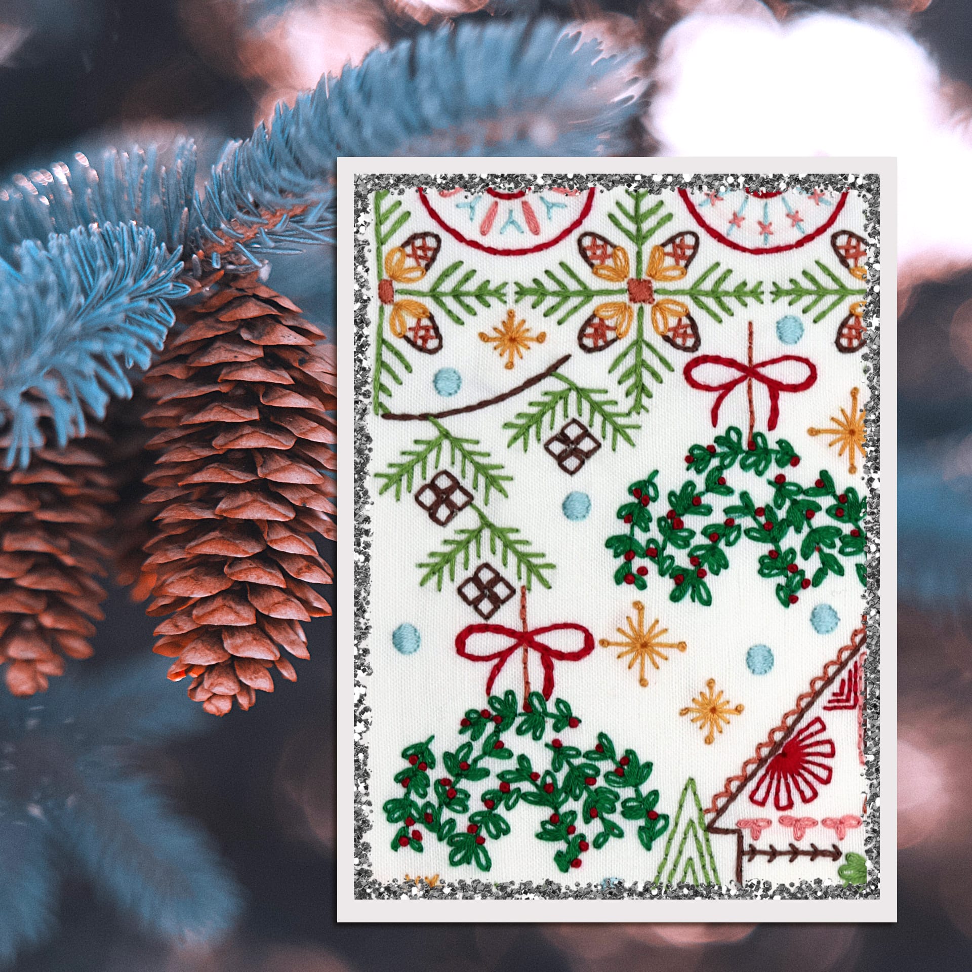 embroidered holiday scene inspired by pinecone wreaths and garlands