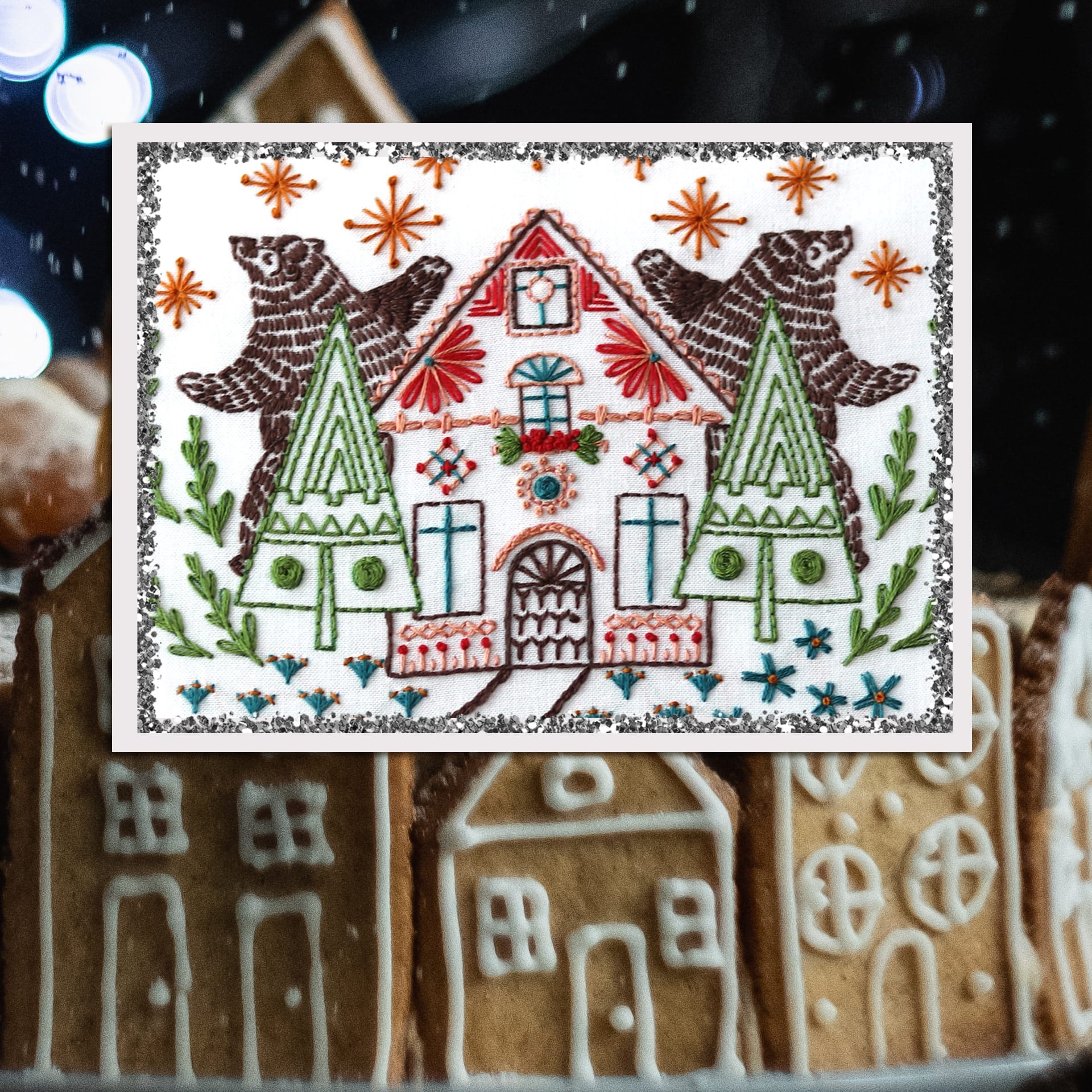 embroidered bears dancing in the starlight behind gingerbread inspired cottage